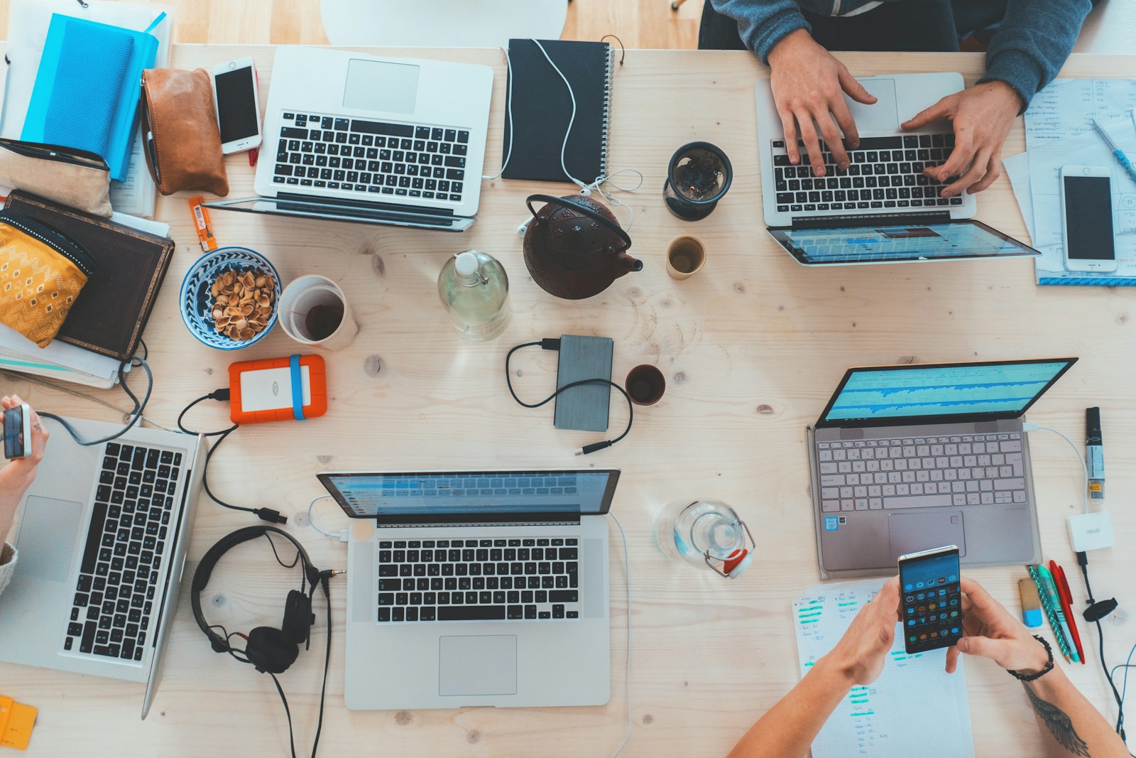 Laptop, monitor, and desk tools in a founder workspace